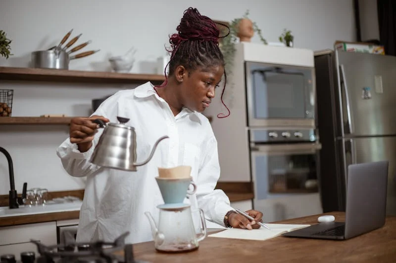A user making coffee